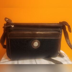 Vintage Mouflon leather handbag with black and brown accents.